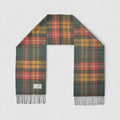 A tartan scarf with Antique Buchanan tartan, featuring a mix of gold, green, and red colors, laid out on a plain surface.