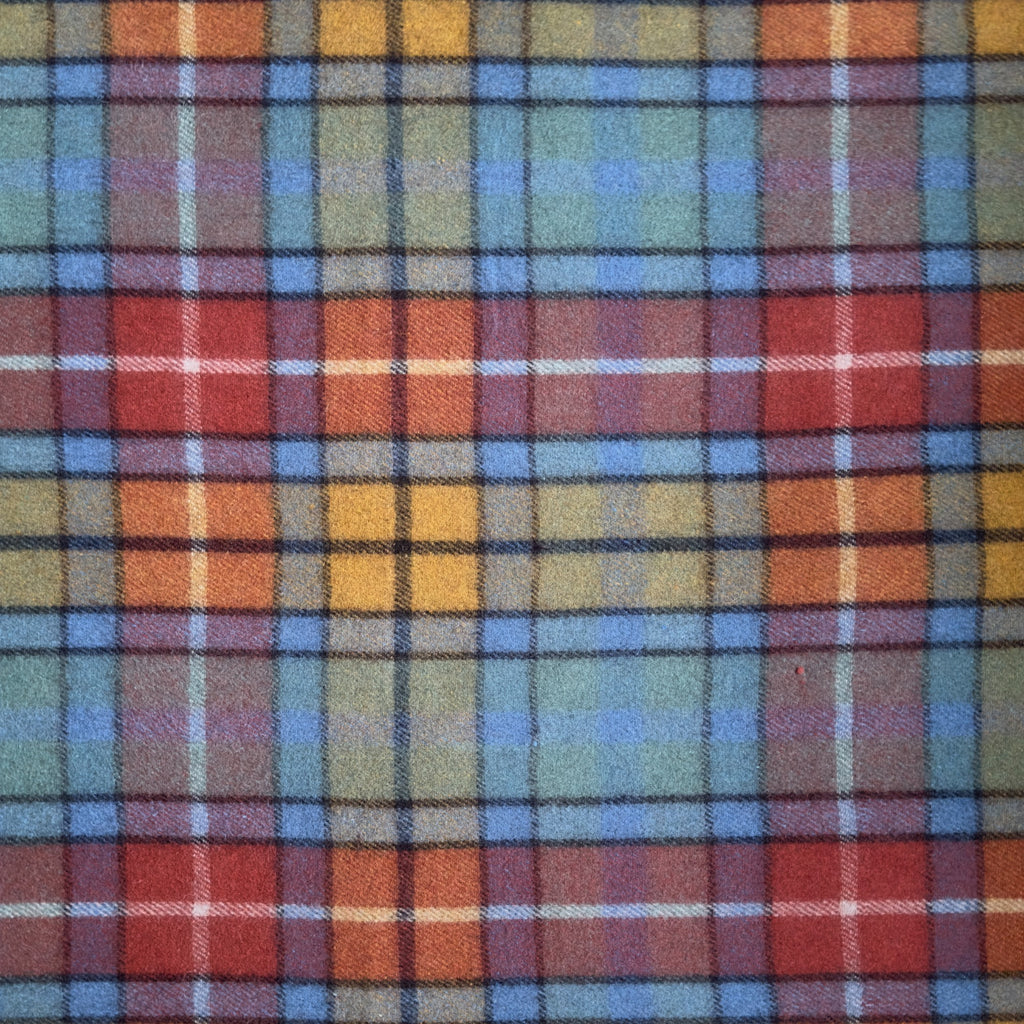 A close up example of the Antique Buchanan tartan, The Antique Buchanan tartan has orange, light blue and dark orange stripes in a checkered pattern.
