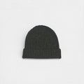 Dark olive cashmere beanie on a white background.