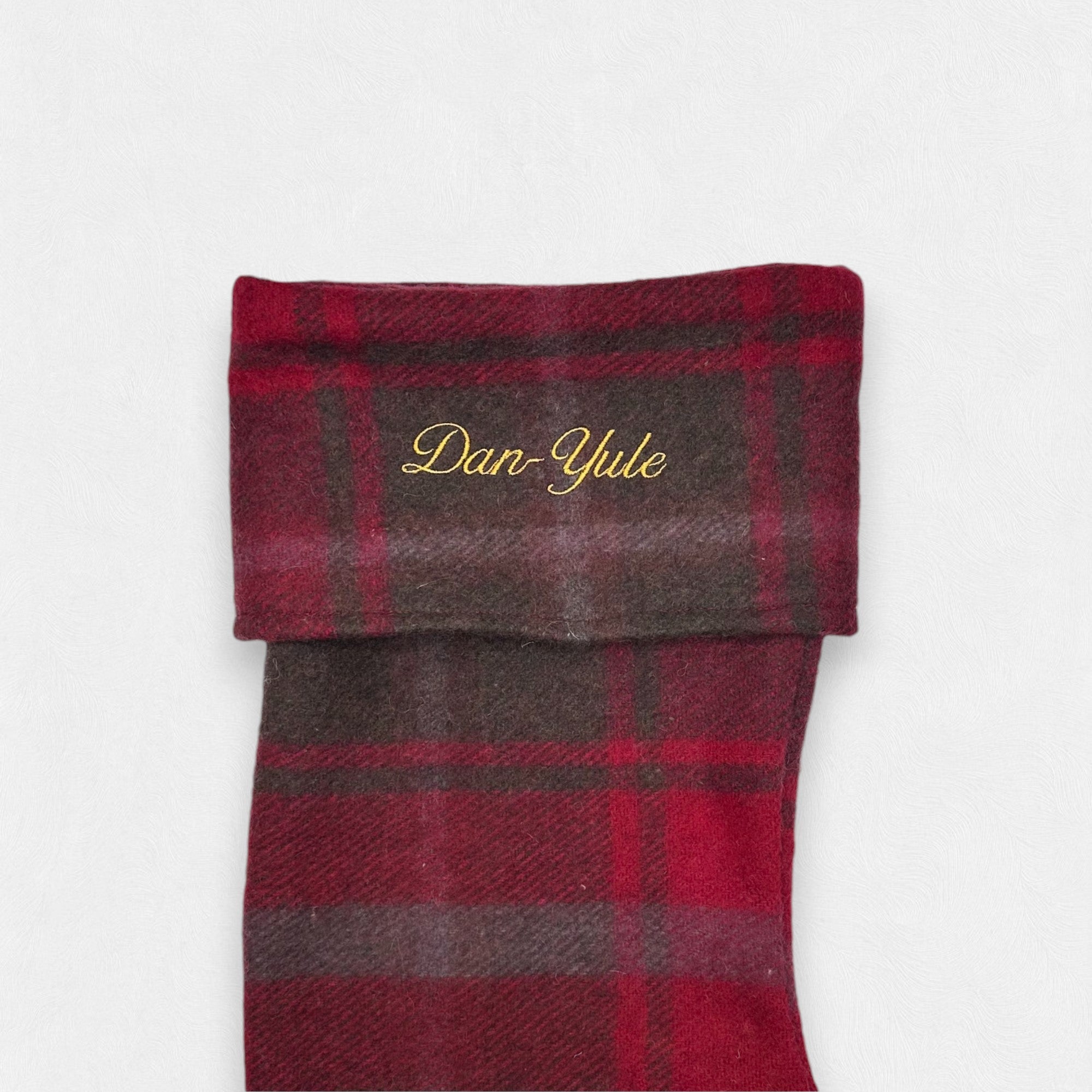 A example of embroidery in fancy font on the maple christmas stocking. 