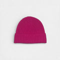 Vibrant Pink knit beanie on a light gray background