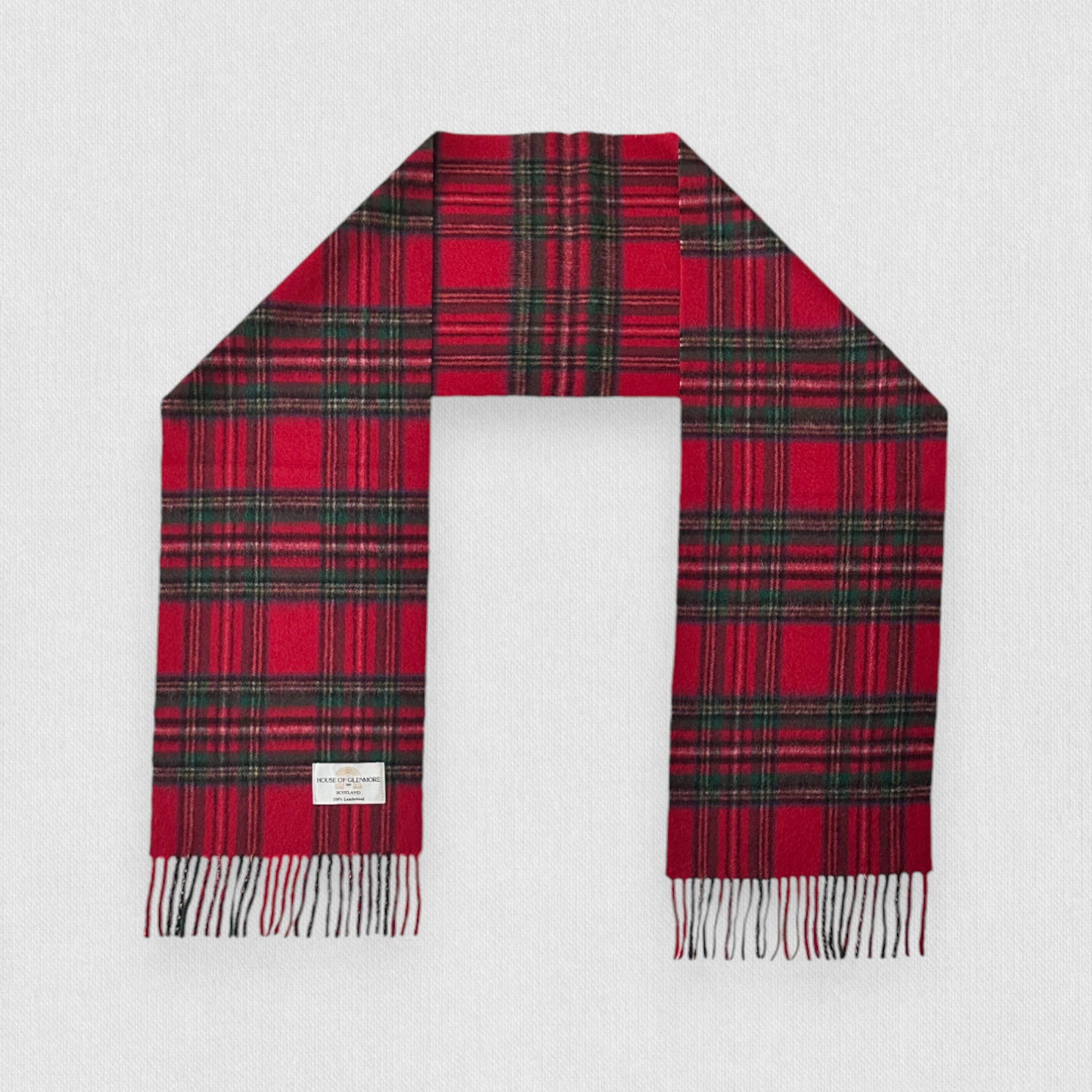 Royal Stewart plaid scarf on a white background