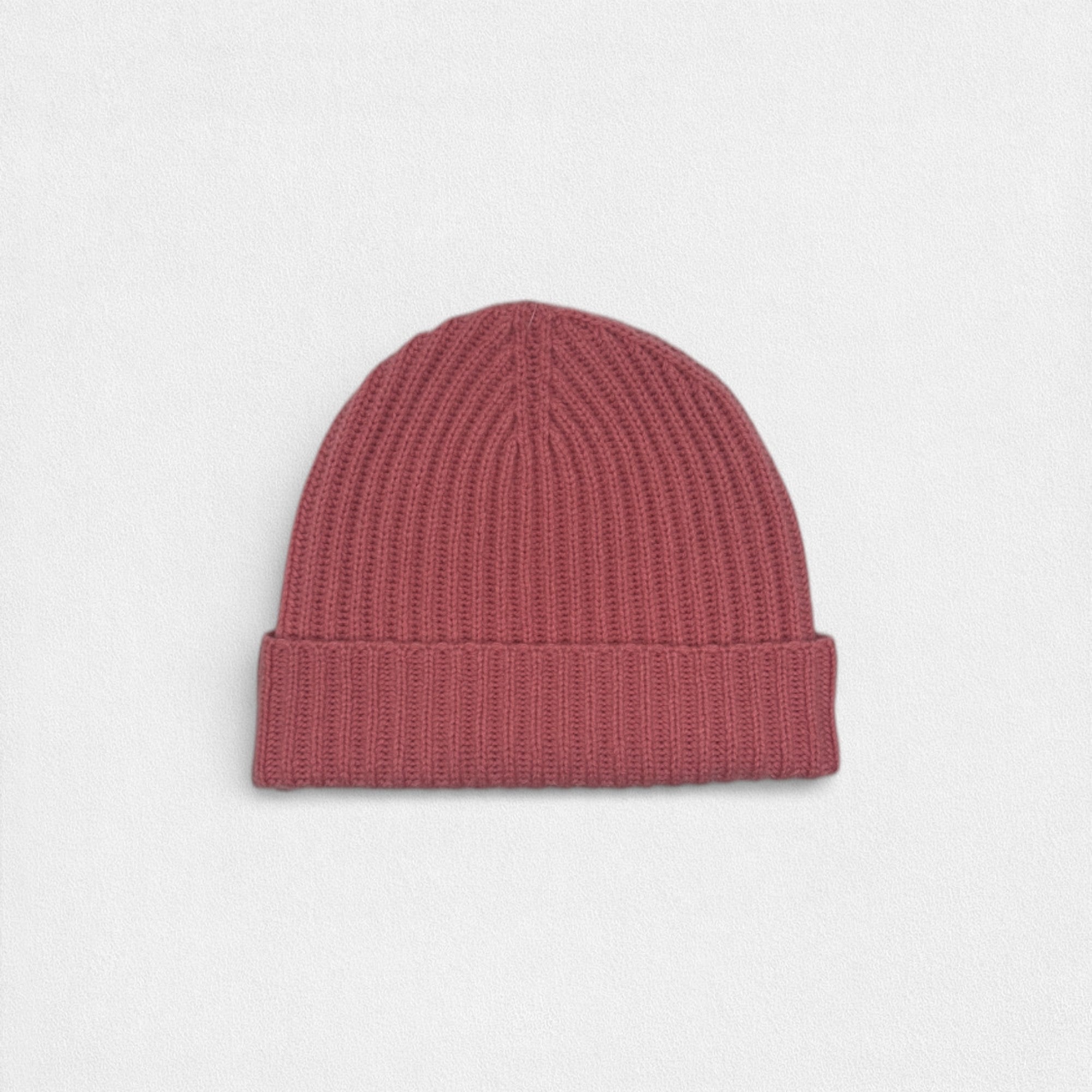 Rose Pink cashmere ribbed beanie on a white background.