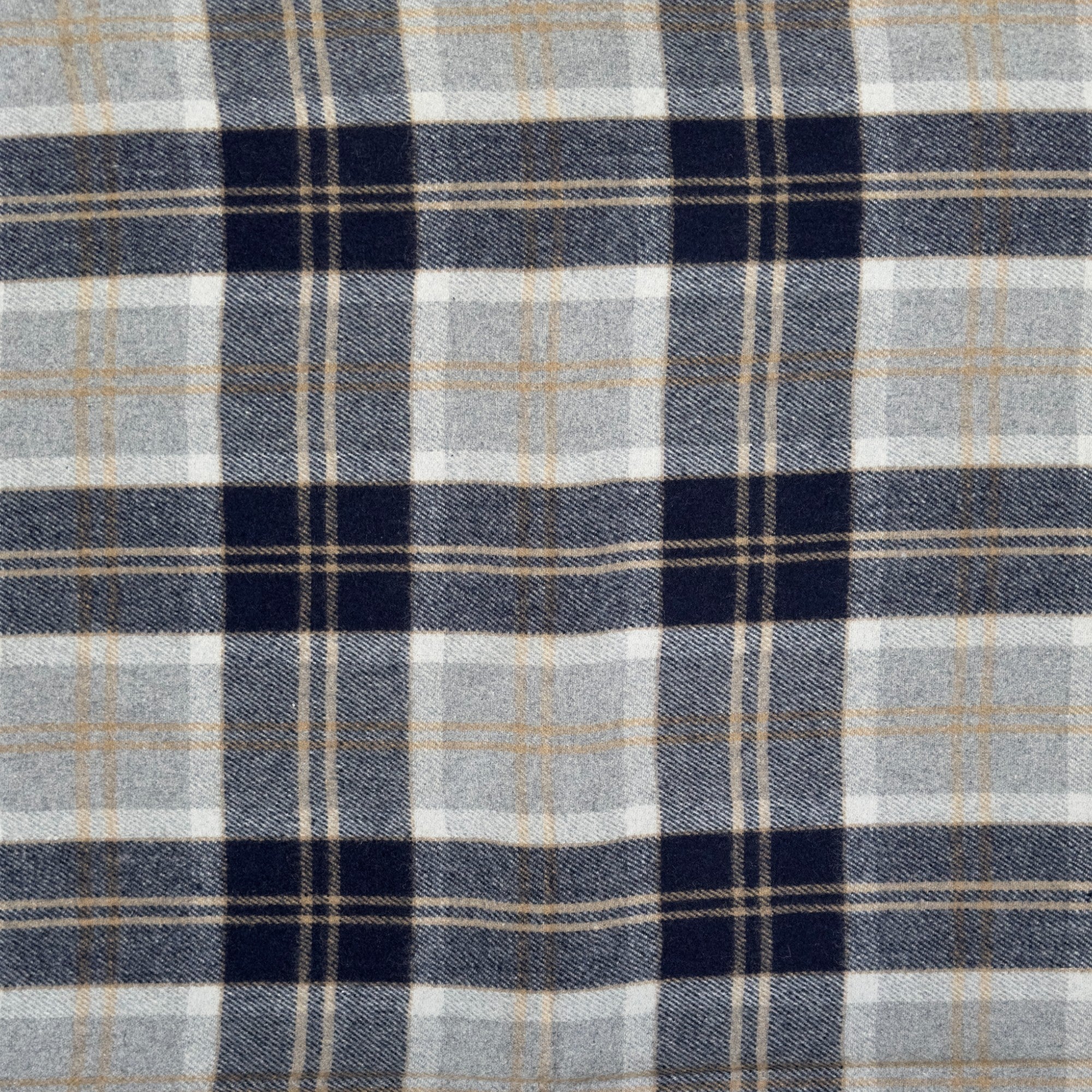 A close up example of the Silver Bannockbane tartan, Silver Bannockbane has navy, grey and gold in a checkered pattern.