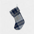 A Silver Bannockbane 100% wool Christmas stocking hanging from a hook on a white background.