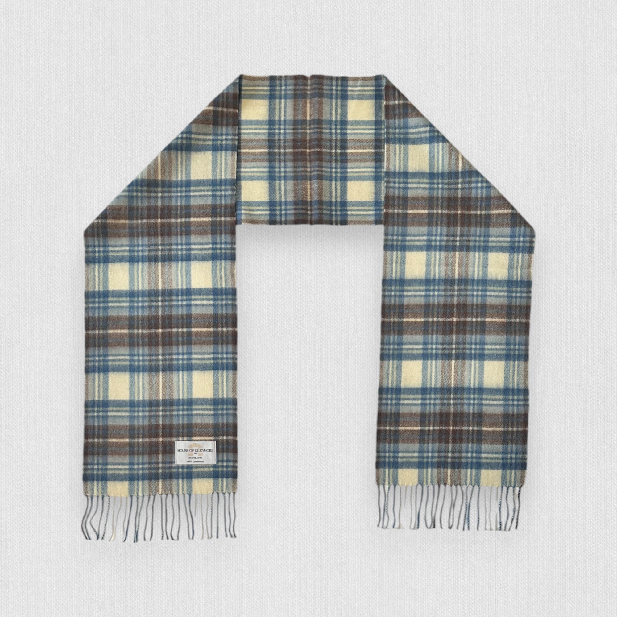 Stewart Muted Blue lambswool tartan scarf on a white background 